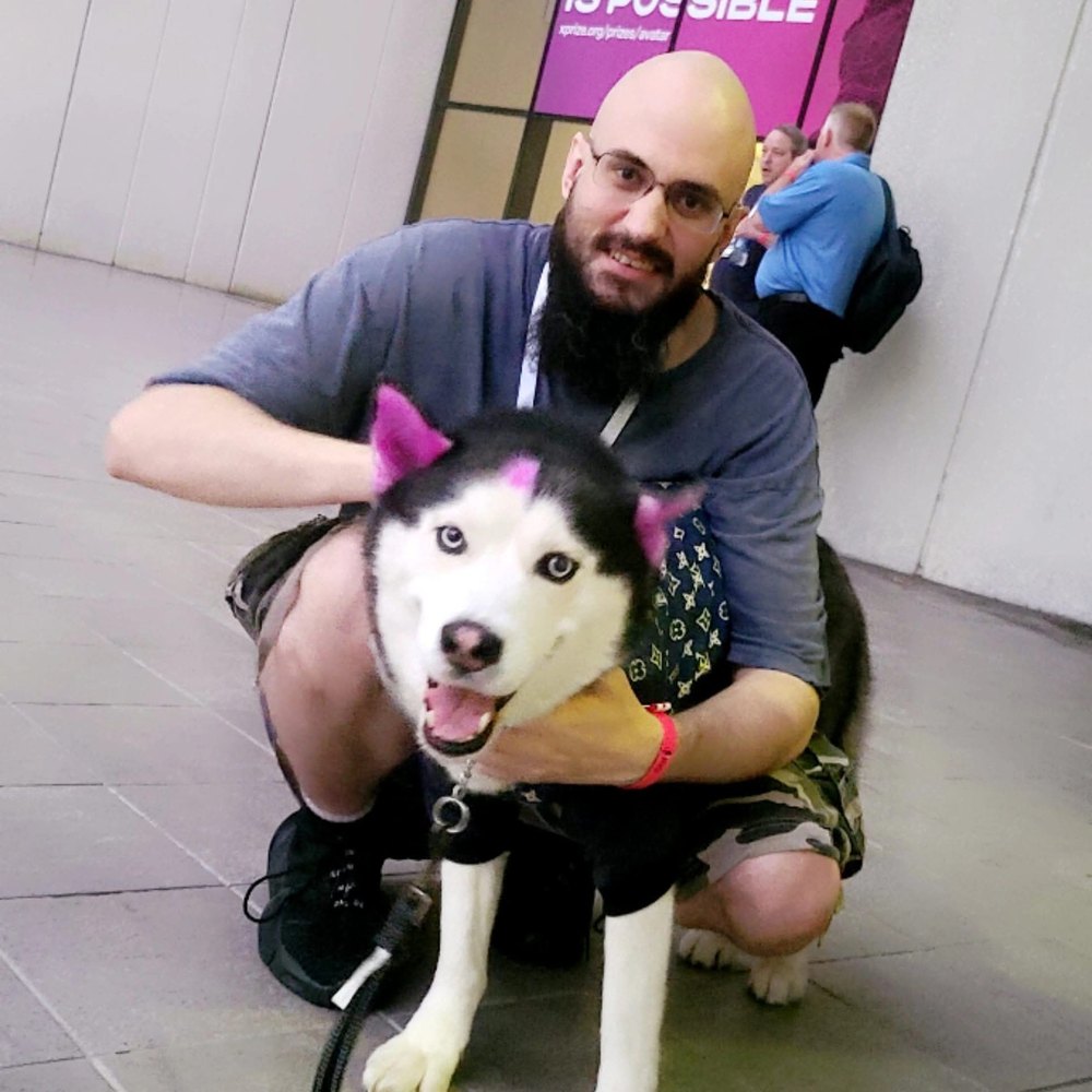 Jeremy Ryan (NFT Demon) with celebrity dog Swaggy Wolfdog